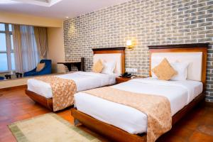 Posteľ alebo postele v izbe v ubytovaní Teeka Resort Suites & Spa