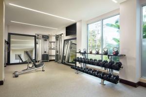 a fitness room with a gym with weights at DoubleTree by Hilton Managua in Managua +42 photos