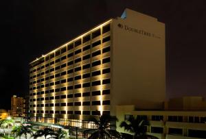 a large building with a do not disturb sign on it at DoubleTree by Hilton Veracruz in Veracruz
