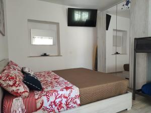 Postel nebo postele na pokoji v ubytování L'uliveto sui Trabocchi