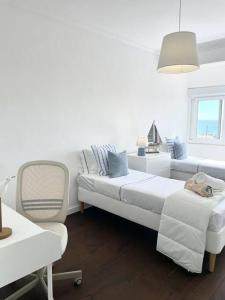 Postel nebo postele na pokoji v ubytování The Luxe View Spot