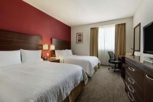 TV a/nebo společenská místnost v ubytování Hilton Garden Inn Queretaro