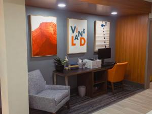 an office with a desk and a chair and a computer at Holiday Inn Express Hotel & Suites Vineland Millville, an IHG Hotel in Vineland