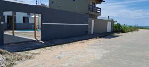 Kolam renang di atau dekat dengan Casa com piscina e espaço gourmet a 30m da praia!