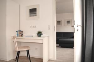 TV a/nebo společenská místnost v ubytování Haus Flora - Mummelke