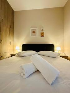 Ένα ή περισσότερα κρεβάτια σε δωμάτιο στο Venetian Gem Central Corfu Retreat