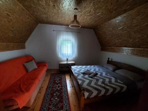 Postel nebo postele na pokoji v ubytování Vila Paramida