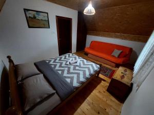 Postel nebo postele na pokoji v ubytování Vila Paramida