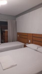 Cama o camas de una habitación en Flat Caldas Novas