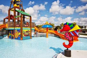 a water park with a water slide and a water park at SUPER CLOSE Beach, Airport, port, Downtown, Wynwood in Miami