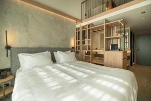 Posteľ alebo postele v izbe v ubytovaní KING MINOS RETREAT Resort & Spa