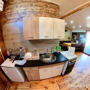a kitchen with a sink and a counter top at Ada Bojana Green in Ulcinj