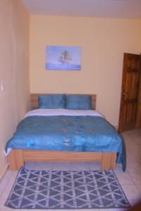 Una cama o camas en una habitación de Le beau séjour - Maison meublée 3 pièces