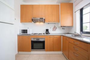 Kuchyň nebo kuchyňský kout v ubytování Borboletas Loft