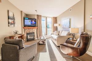 TV a/nebo společenská místnost v ubytování Cascade Lodge by Elevate Vacations
