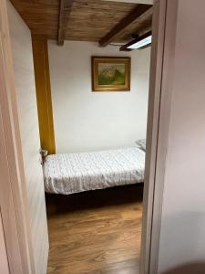 Postel nebo postele na pokoji v ubytování Antico Oratorio dei Razza