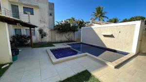 Bazén v ubytování Cond. Villa dos Corais nas praias de Coroa Vermelha nebo v jeho okolí