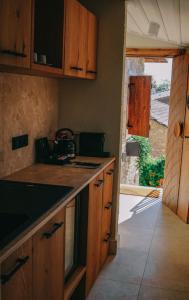 Kuchyň nebo kuchyňský kout v ubytování 6 ROOMS BY AZUMARE