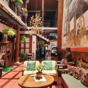 Posezení v ubytování HOTEL CASA BAEZ