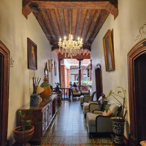 Posezení v ubytování HOTEL CASA BAEZ