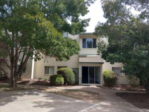 a white house with a driveway in front of it at Beautiful Outlook, nr Canberra Hospital @Woden in Phillip
