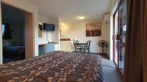 Postel nebo postele na pokoji v ubytování Airways Motel
