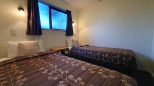 Postel nebo postele na pokoji v ubytování Airways Motel