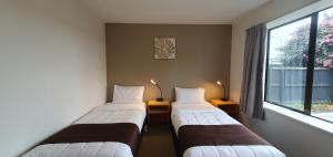 Postel nebo postele na pokoji v ubytování Airways Motel