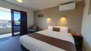 Postel nebo postele na pokoji v ubytování Airways Motel
