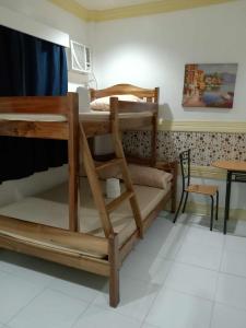 Postel nebo postele na pokoji v ubytování Bountiful Inn