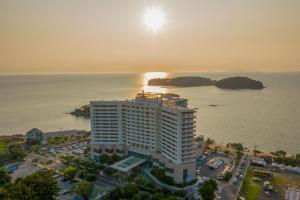 an aerial view of a large building next to the ocean at Beache Palace in Boryeong