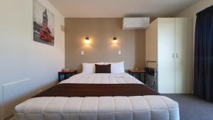 Postel nebo postele na pokoji v ubytování Airways Motel