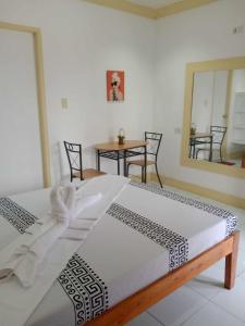 Postel nebo postele na pokoji v ubytování Bountiful Inn