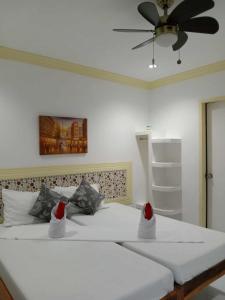Postel nebo postele na pokoji v ubytování Bountiful Inn + 20 fotografií