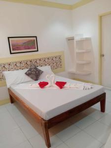 Postel nebo postele na pokoji v ubytování Bountiful Inn