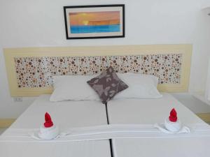 Postel nebo postele na pokoji v ubytování Bountiful Inn