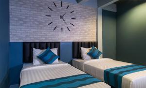 Postel nebo postele na pokoji v ubytování Amity Poshtel
