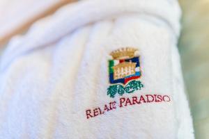 Certifikát, hodnocení, plakát nebo jiný dokument vystavený v ubytování Relais Paradiso Resort & Spa