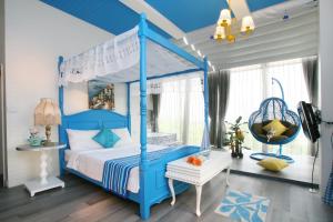 Postel nebo postele na pokoji v ubytování Hao Wang Jiao House