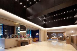 Area soggiorno di Hampton by Hilton Shenzhen Futian Port