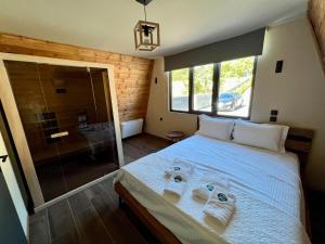 Postel nebo postele na pokoji v ubytování Pavliani4rest - Luxury Cabins