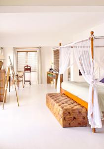 Voodi või voodid majutusasutuse Hôtel 20 Degrés Sud - Relais & Châteaux toas