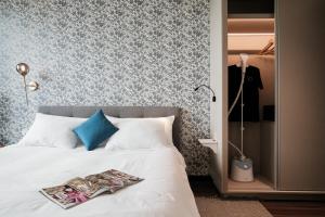 Voodi või voodid majutusasutuse Lux Executive Residence @ Empire City by CIRCADIAN toas