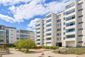 an image of an apartment building at Scandic Primo Apartments - Design District 69m2 in Helsinki