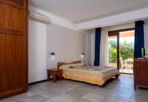 Postel nebo postele na pokoji v ubytování Moresco Resort + 37 fotografií