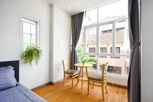 Posezení v ubytování Cali Homestay