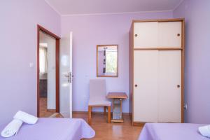 Posteľ alebo postele v izbe v ubytovaní Villa Planika