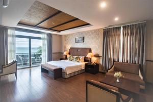 Postel nebo postele na pokoji v ubytování Seaside Resort Vung Tau
