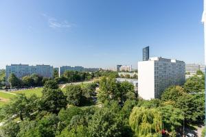 a view of a city with trees and buildings at Stylish Apartment near Wroclavia for 4 Guests by Renters in Wrocław