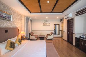 Postel nebo postele na pokoji v ubytování Seaside Resort Vung Tau